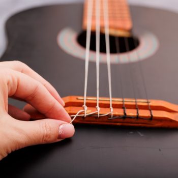 changing strings on a classical guitar changing strings on a classical guitar